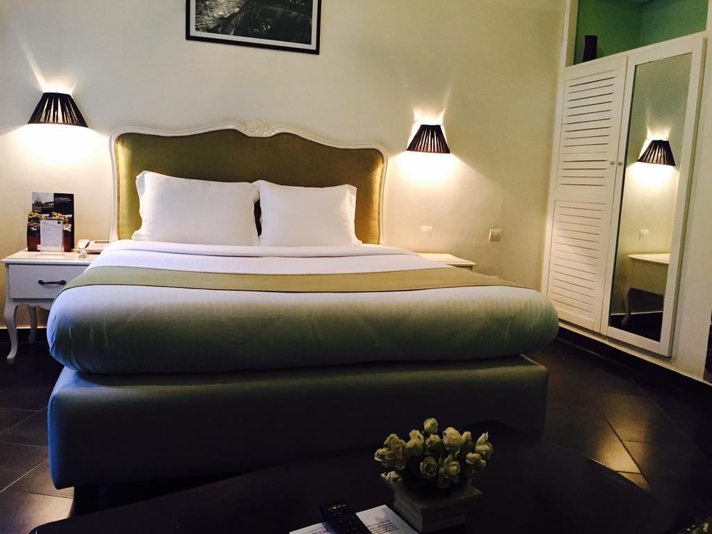 Detente Hotel Abidjan Exterior photo