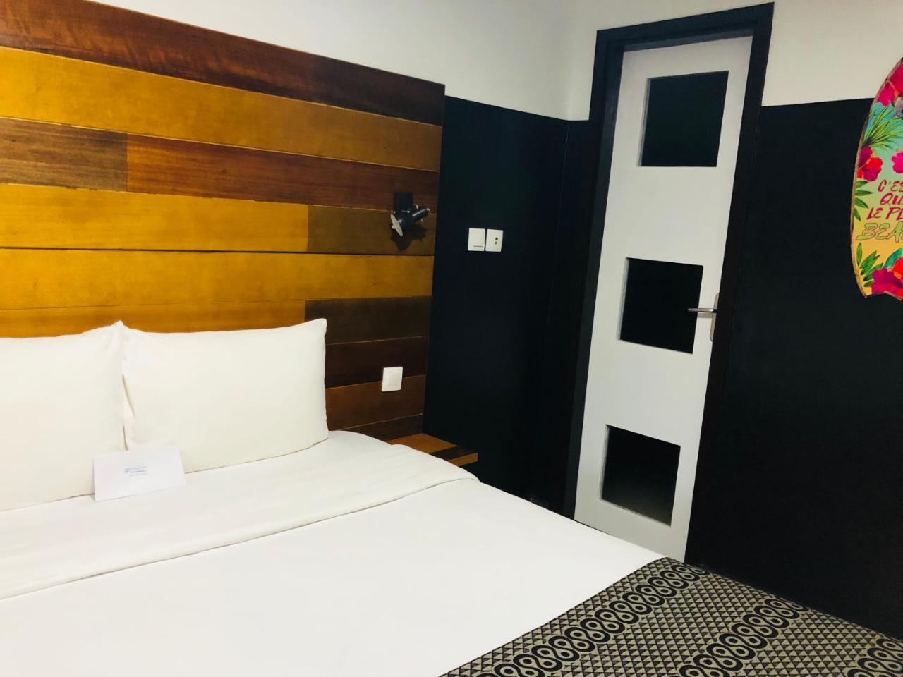 Detente Hotel Abidjan Exterior photo